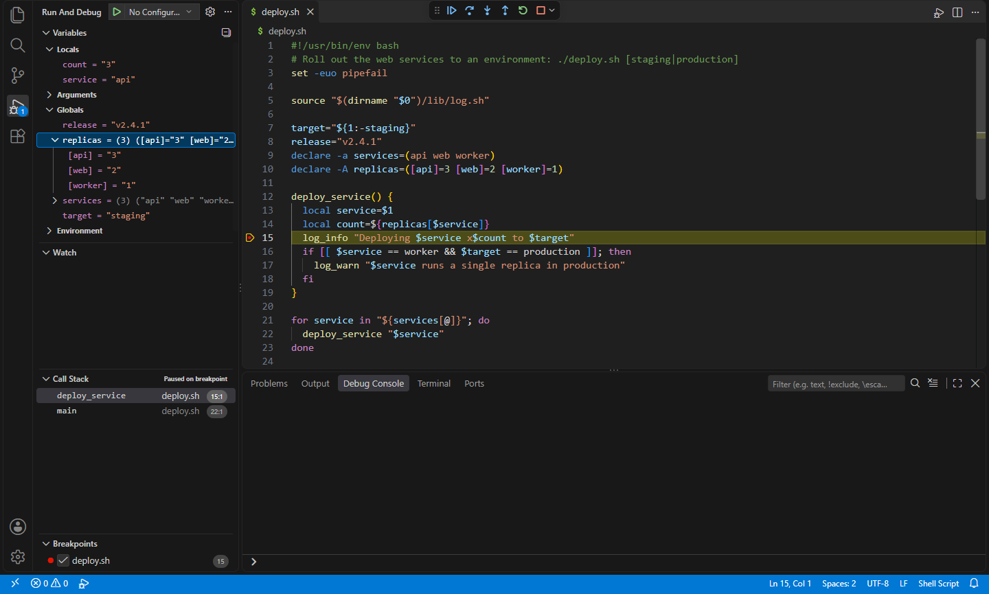 Stopped at a breakpoint in a deploy script, with locals, globals and an associative array in the Variables view